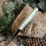 Bobcat - layered white linen and Tiffany blue g10 with Tiffany blue g10 liners and pins