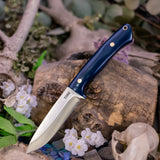 Artemis bushcrafter - blue paper micarta - black pinstripes - blue liners - brass pins