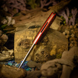 Artemis (x-ray) desert ironwood burl - red glow pinstripes - titanium liners