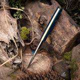 Gambler - Blue Burlap - yellow liners - brass mosaics.