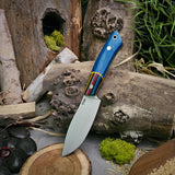 Prototype Polaris - Blue Burlap micarta with Mexican blanket bolster - yellow and black canvas liners - mosaic pins